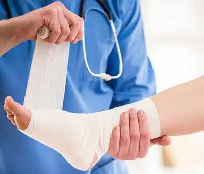 Wound care bandaging by specialist
